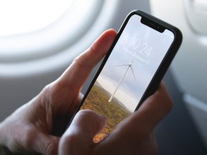 Free iPhone XS on a Plane Mockup